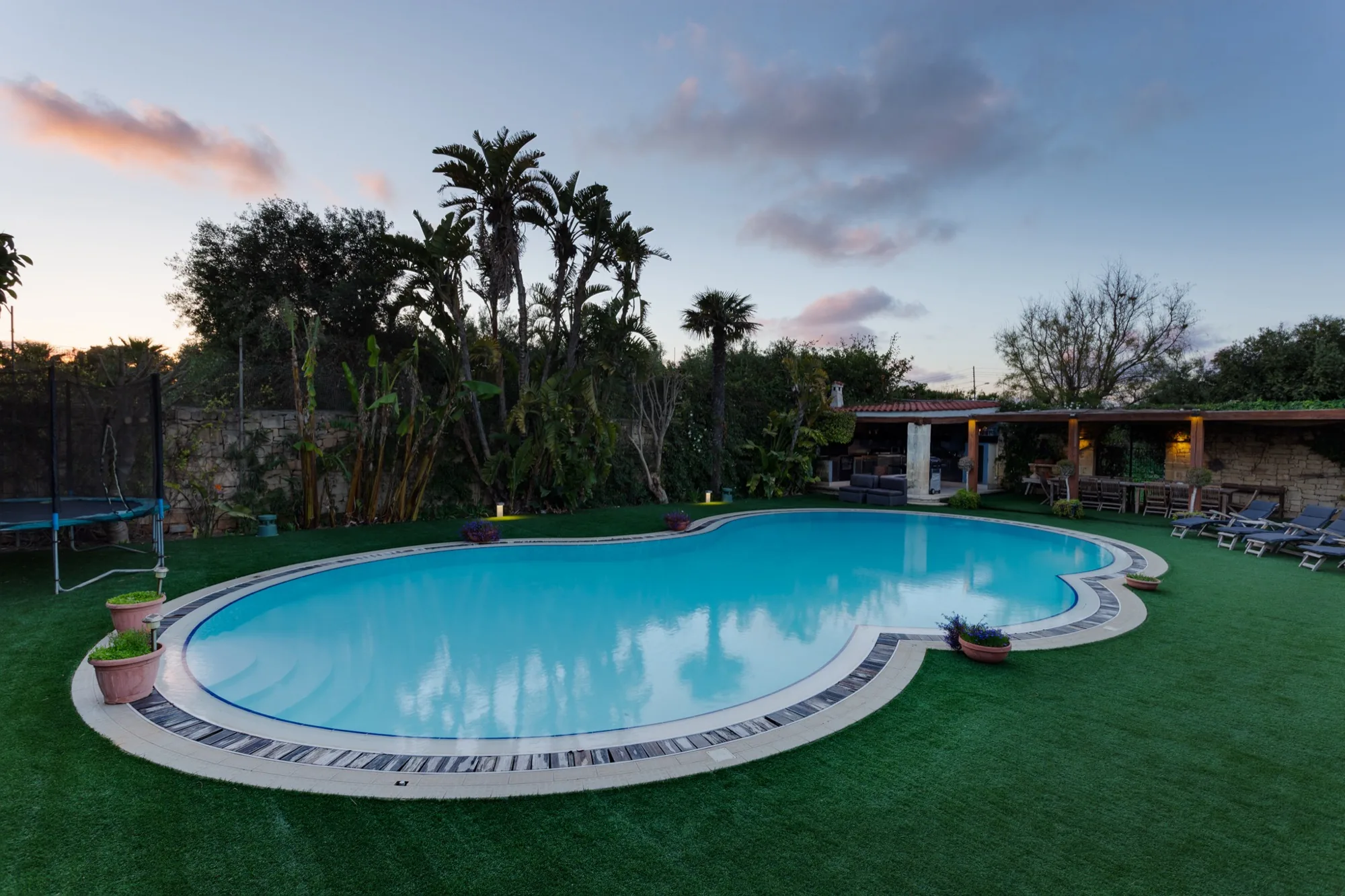 Manicured lawn with fountain at Nine Angels Villa event venue, Madliena Malta
